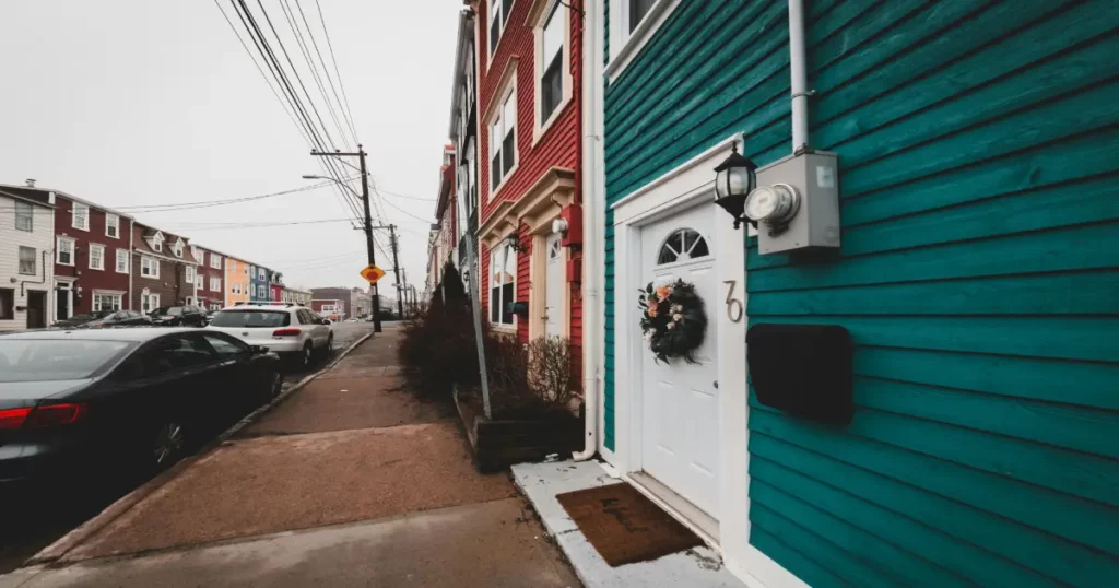 photo of a house in Atlanta, GA focusing on the electrical panel visible through an open door near the exterior